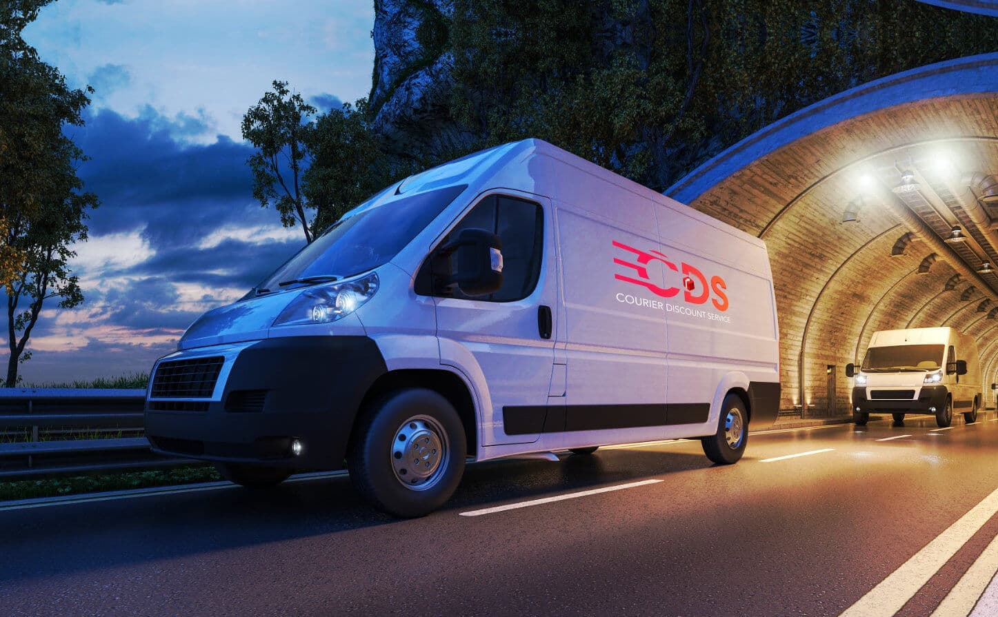 white van passing through a tunnel