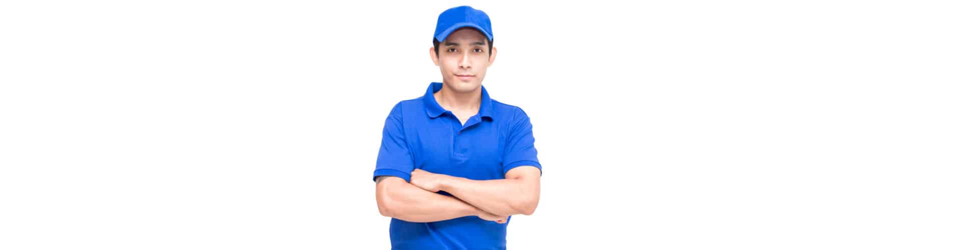 portrait of a delivery man in blue uniform